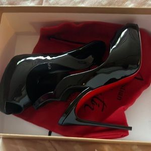 Red bottom originally $999.00 they are two small will take $700.00